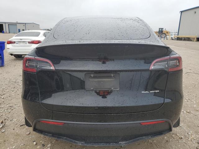 2023 Tesla Model Y VIN: 7SAYGAEE1PF894520 Lot: 57692674