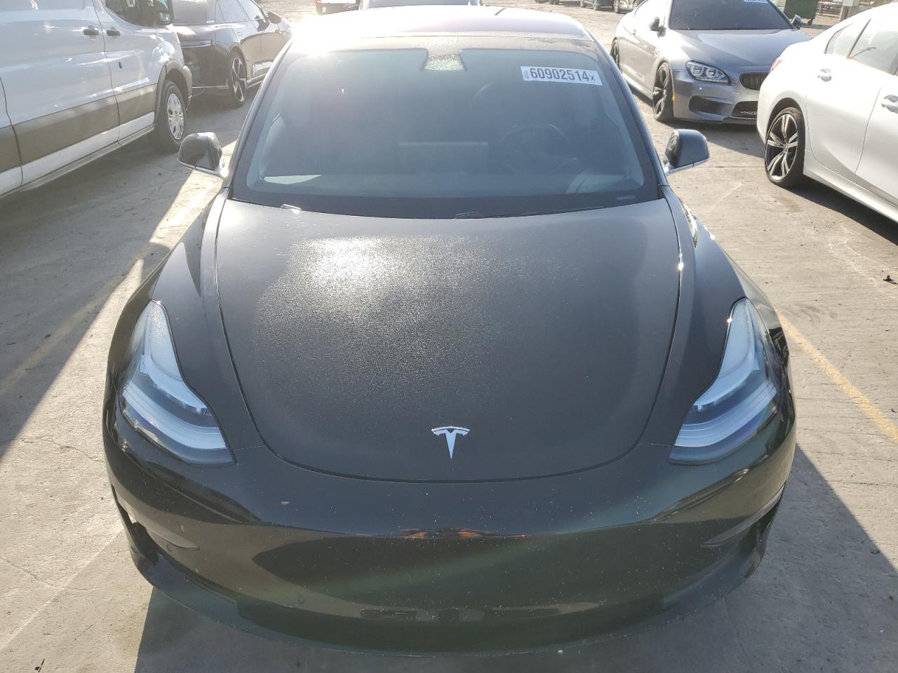 2019 Tesla Model 3 vin: 5YJ3E1EA7KF297035