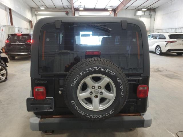 2004 Jeep Wrangler / Tj Se VIN: 1J4FA29114P771377 Lot: 57394224