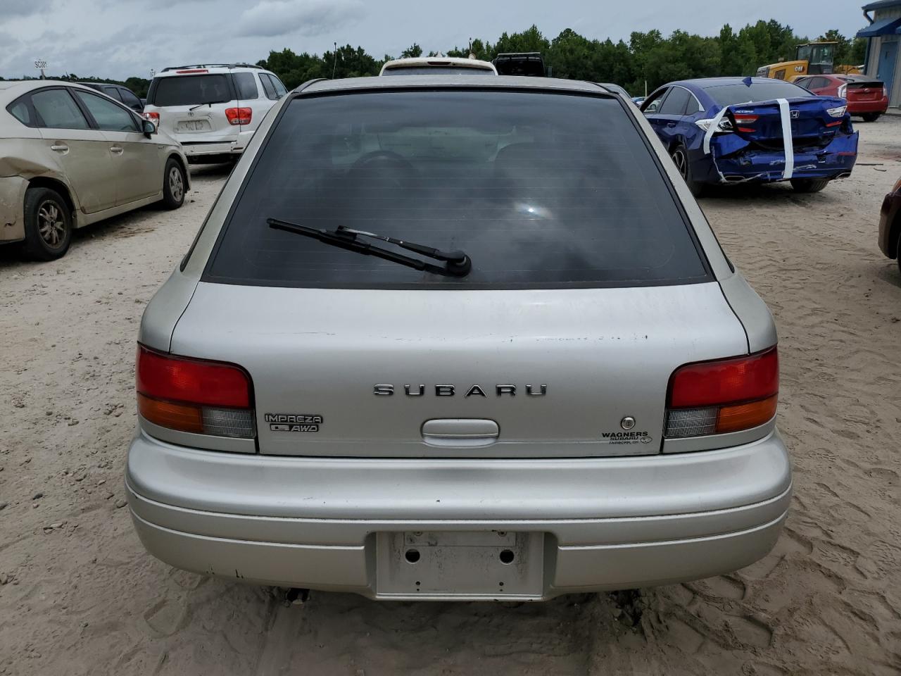 JF1GF4350XG802647 1999 Subaru Impreza L