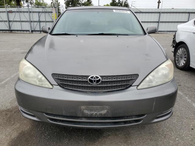 2003 Toyota Camry Le VIN: JTDBE32K330182890 Lot: 59303574