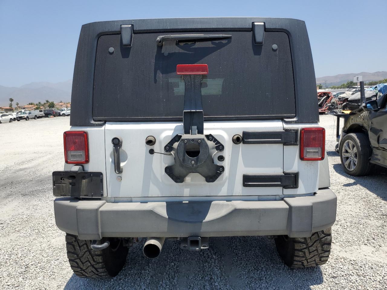 1C4BJWDG3EL247244 2014 Jeep Wrangler Unlimited Sport