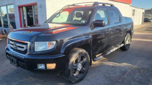 2011 Honda Ridgeline Rtl VIN: 5FPYK1F58BB453168 Lot: 58940574