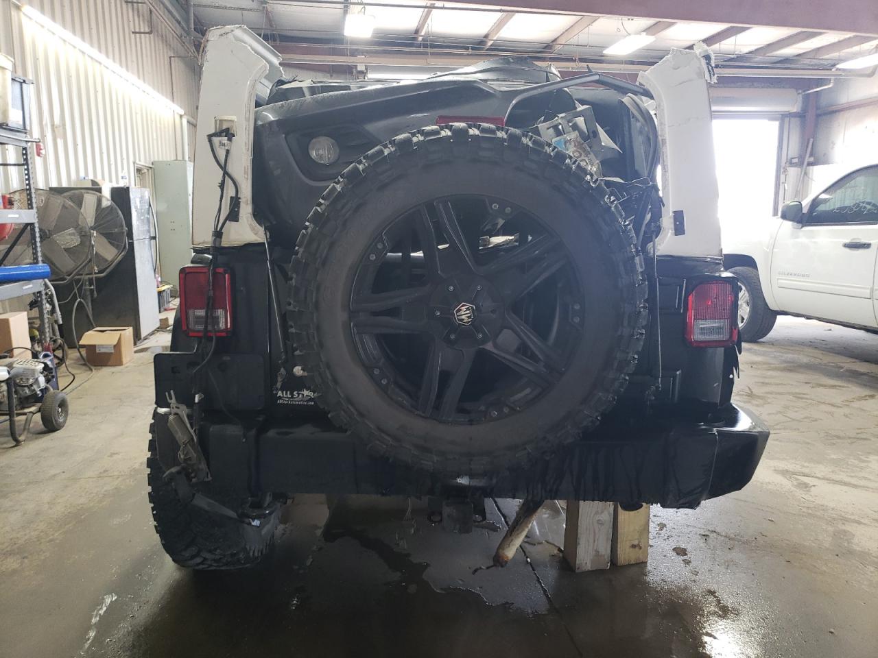 1C4BJWDG5EL263980 2014 Jeep Wrangler Unlimited Sport