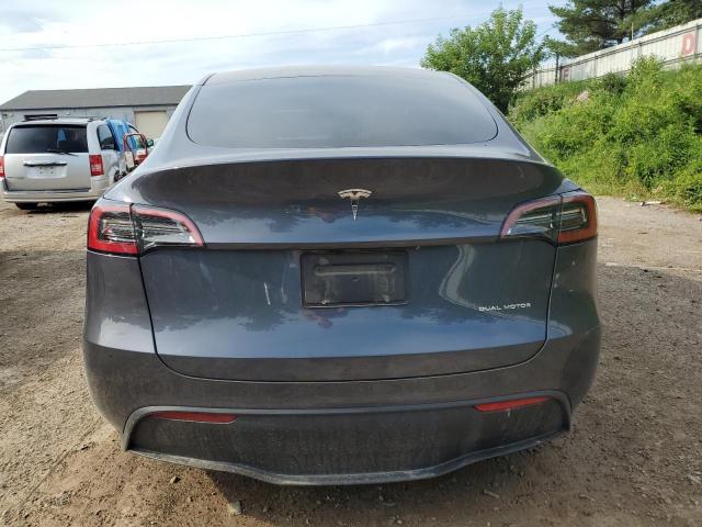 2023 Tesla Model Y VIN: 7SAYGDEE4PA203186 Lot: 58659034