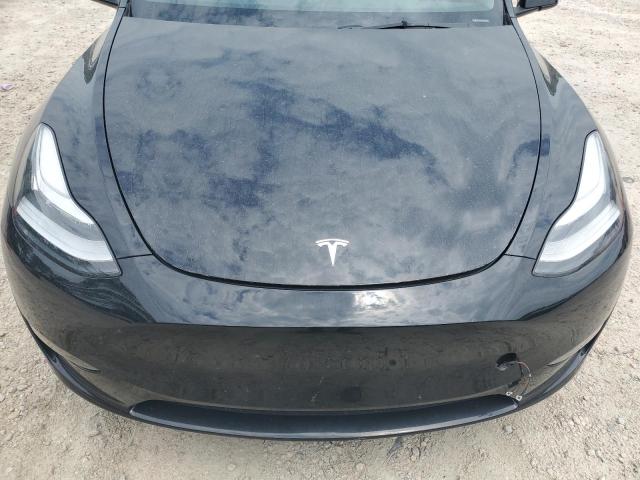 2023 Tesla Model Y VIN: 7SAYGDEE5PA054609 Lot: 57670894