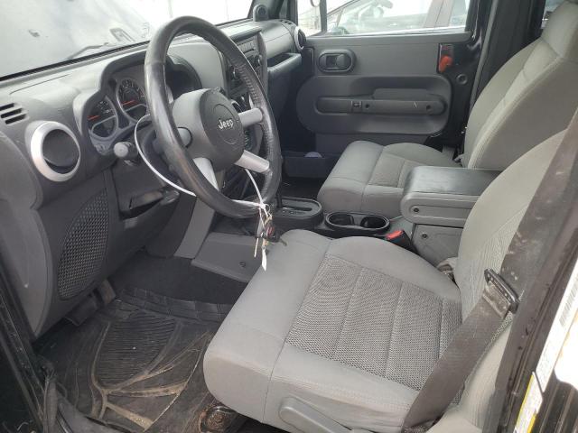 2009 Jeep Wrangler Unlimited Sahara VIN: 1J4GA59139L706227 Lot: 58869224