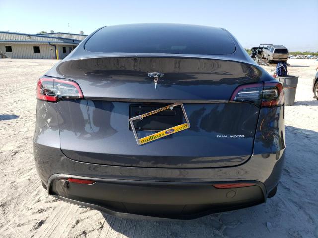 2023 Tesla Model Y VIN: 7SAYGDEE4PF832692 Lot: 57928044