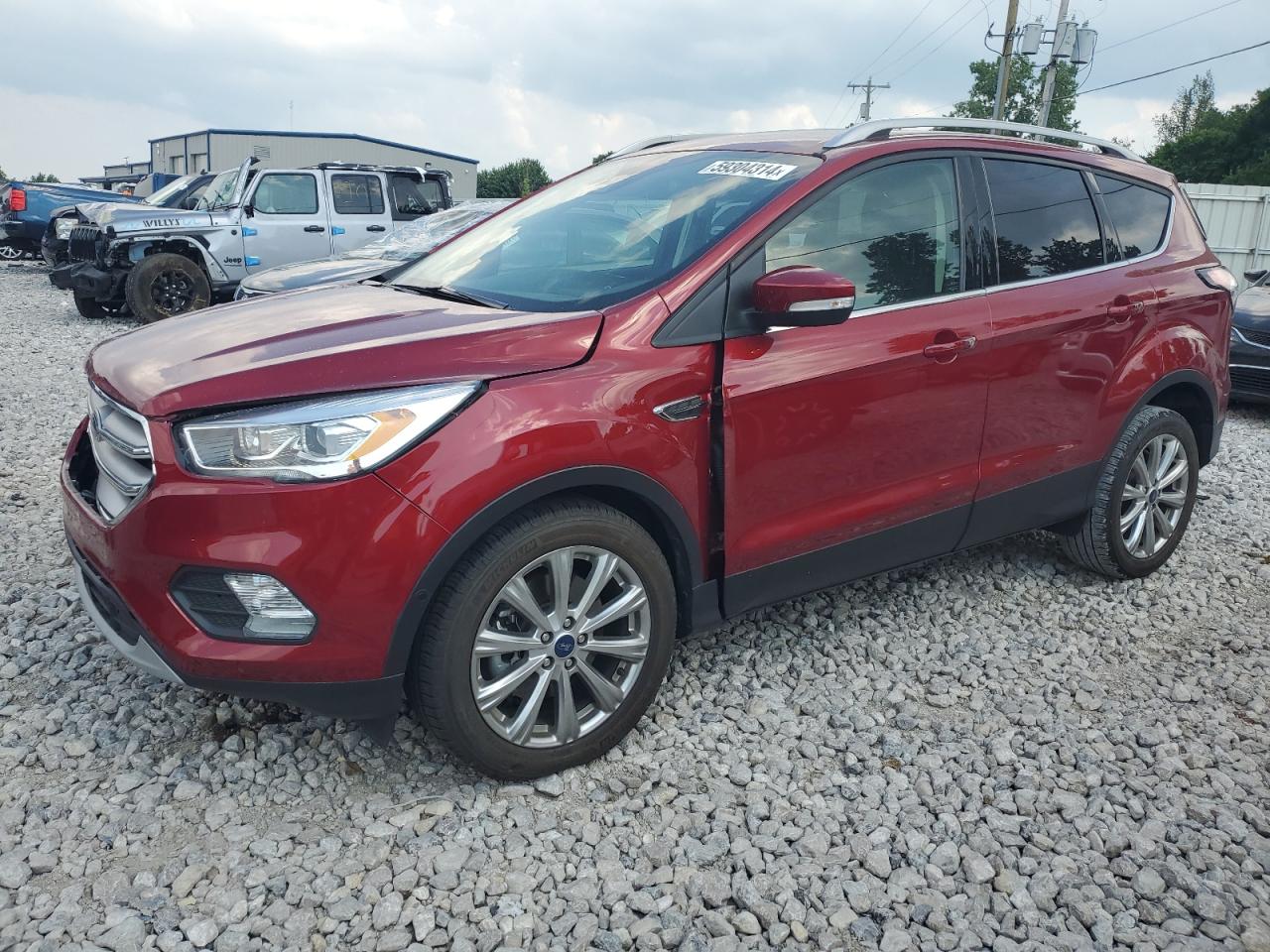 1FMCU0J9XJUC32237 2018 Ford Escape Titanium