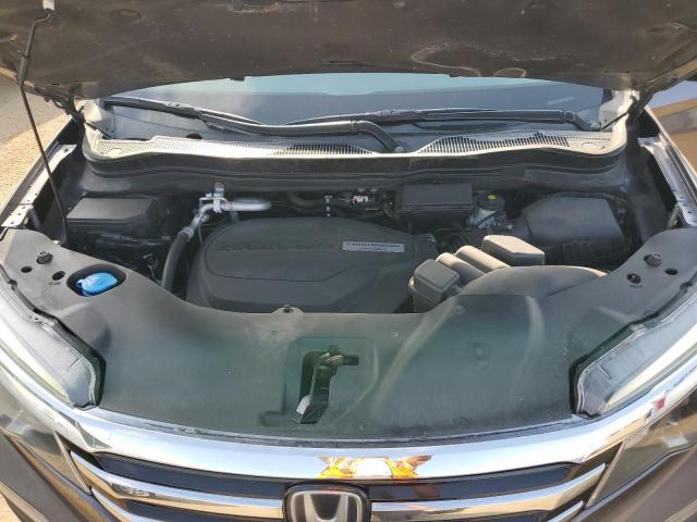 2018 Honda Pilot Touring VIN: 5FNYF6H97JB010082 Lot: 58909494