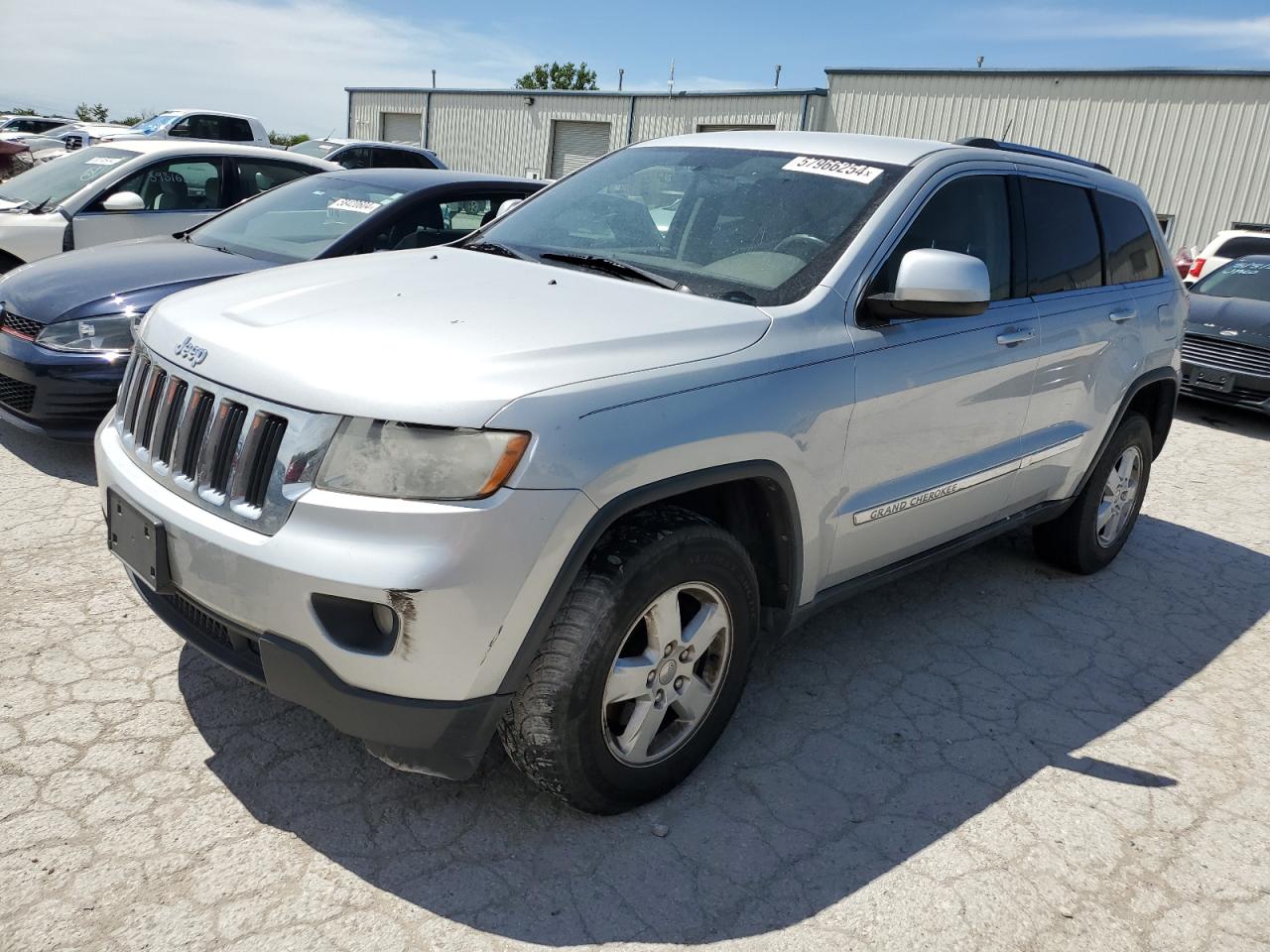 1C4RJEAGXCC317946 2012 Jeep Grand Cherokee Laredo