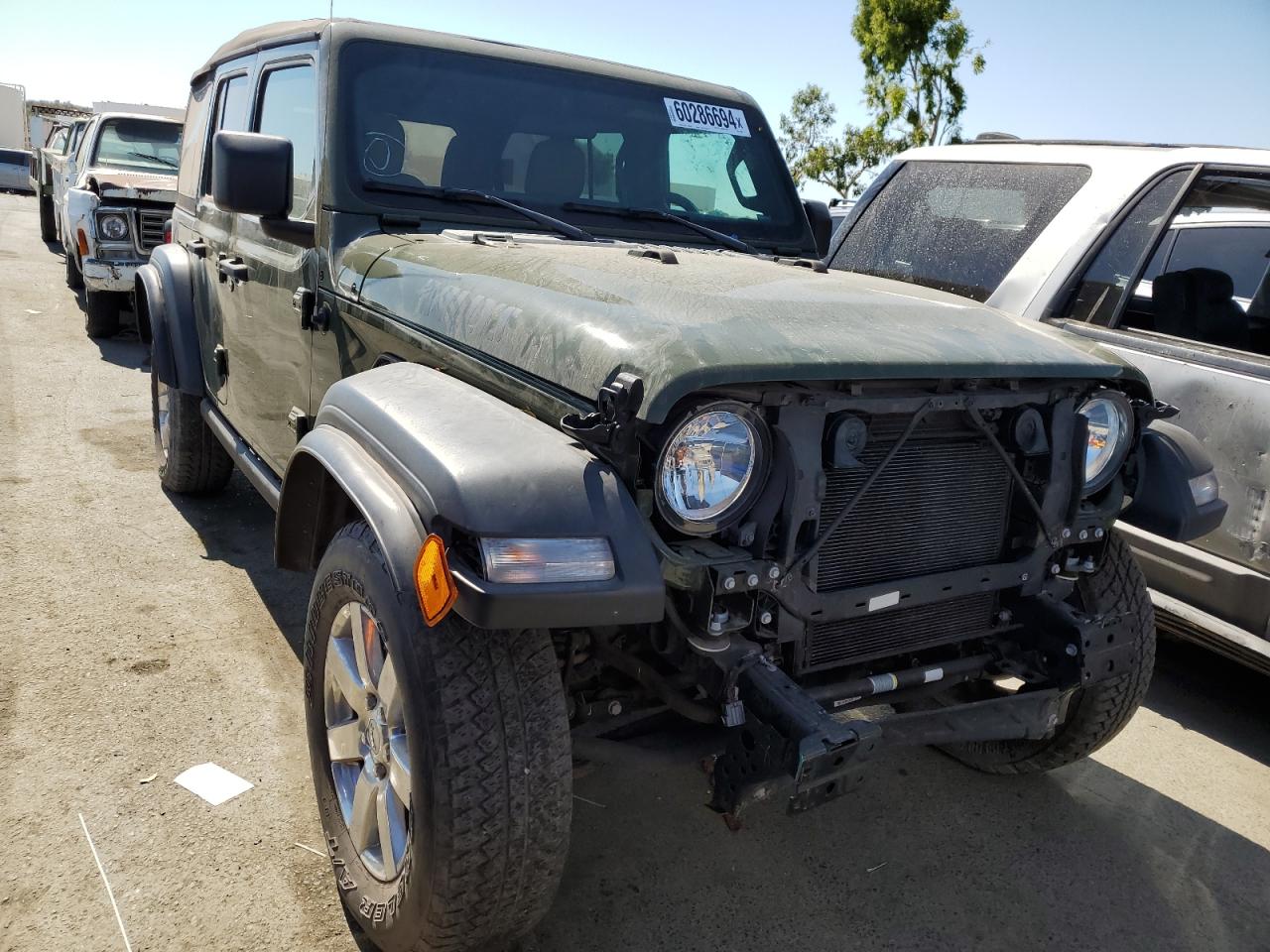 2021 Jeep Wrangler Unlimited Sport vin: 1C4HJXDG1MW774423