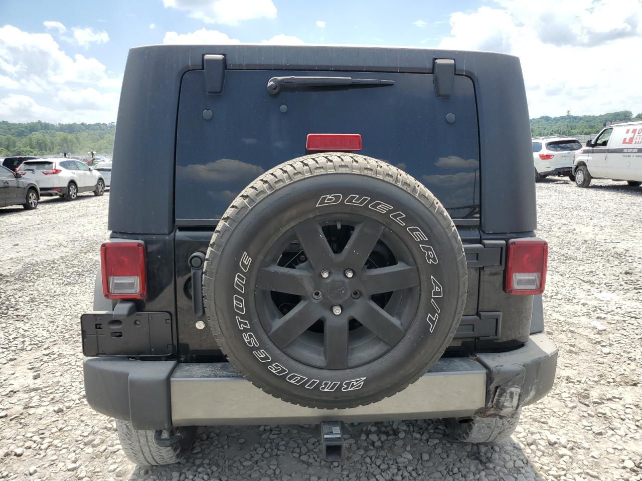 1J4BA3H16AL203411 2010 Jeep Wrangler Unlimited Sport