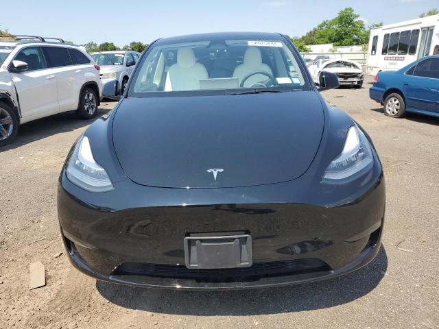 2023 Tesla Model Y VIN: 7SAYGDEE9PA108297 Lot: 58025494