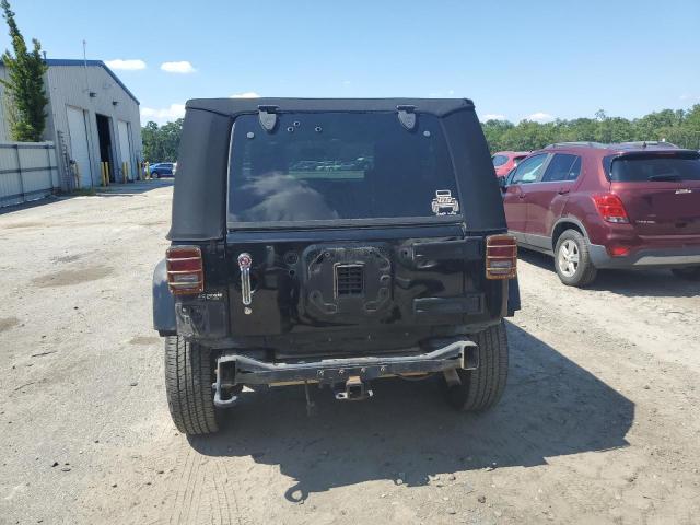 2009 Jeep Wrangler Unlimited Sahara VIN: 1J4GA59129L766144 Lot: 58518534