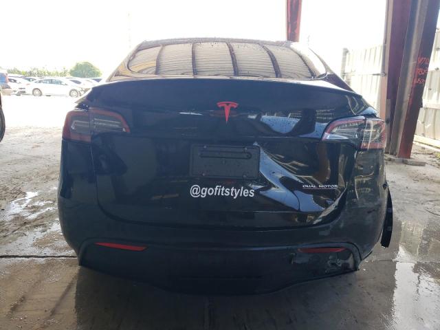 2023 Tesla Model Y VIN: 7SAYGDEF0PF593344 Lot: 57409504