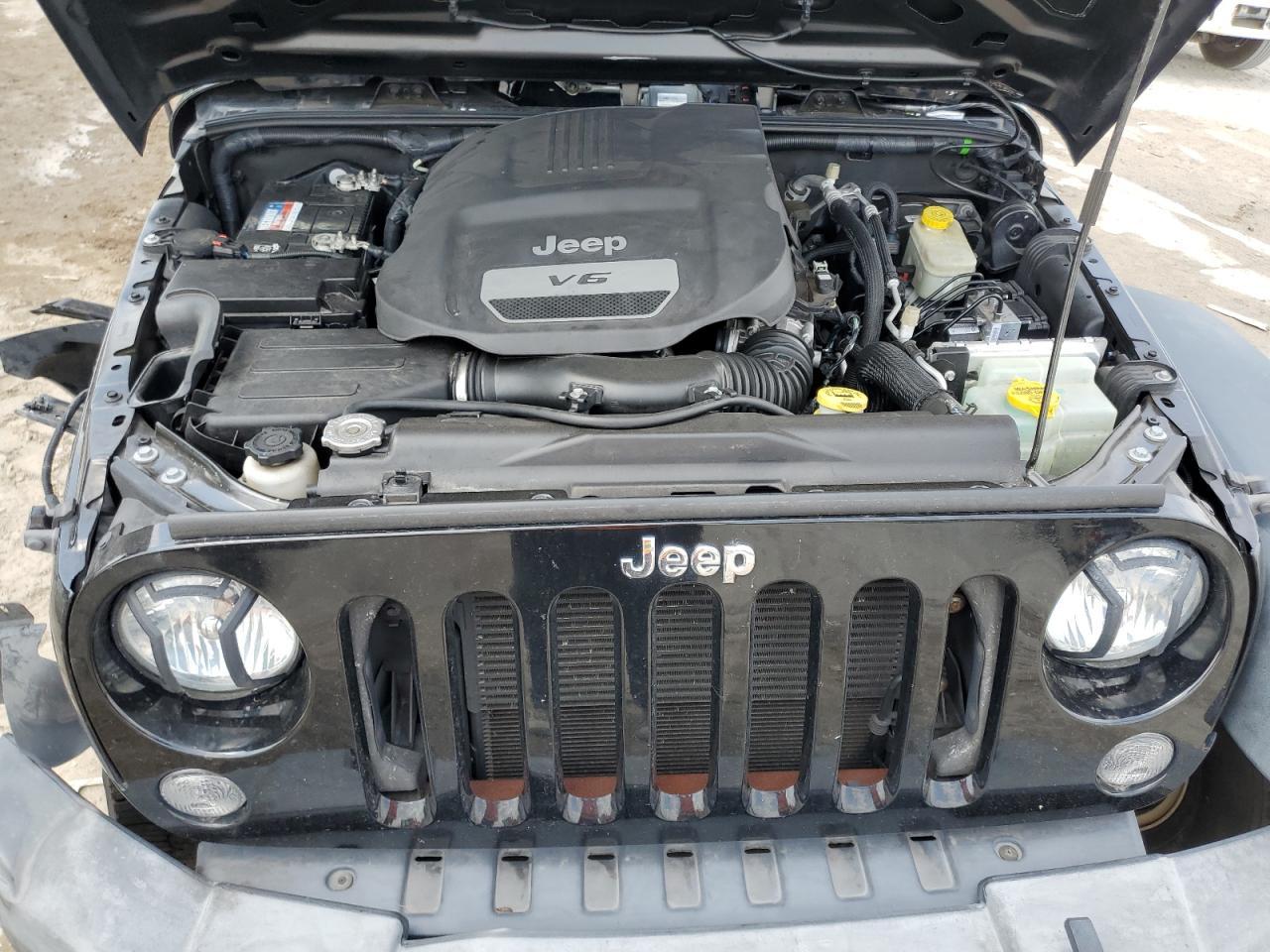 1C4BJWDG9GL345858 2016 Jeep Wrangler Unlimited Sport