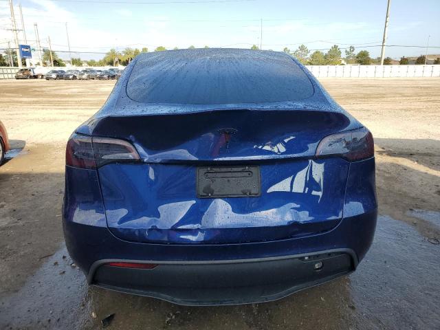 2023 Tesla Model Y VIN: 7SAYGDEE4PA087665 Lot: 58059274