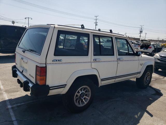 1987 Jeep Cherokee Laredo VIN: 1JCMT7840HT142690 Lot: 58177554