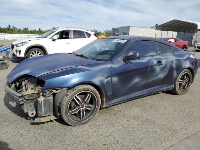 2004 Hyundai Tiburon VIN: KMHHM65D44U129553 Lot: 56969114