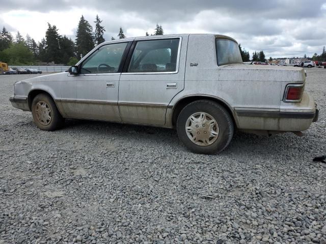 1989 Dodge Dynasty VIN: 1B3BC4635KD561476 Lot: 60512604