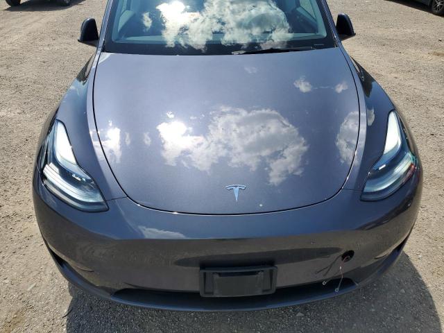 2023 Tesla Model Y VIN: LRWYGDFD1PC057653 Lot: 60291894