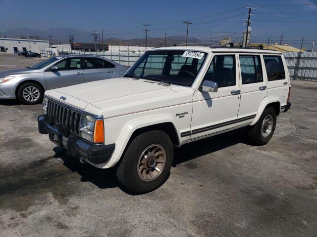 1987 Jeep Cherokee Laredo VIN: 1JCMT7840HT142690 Lot: 58177554