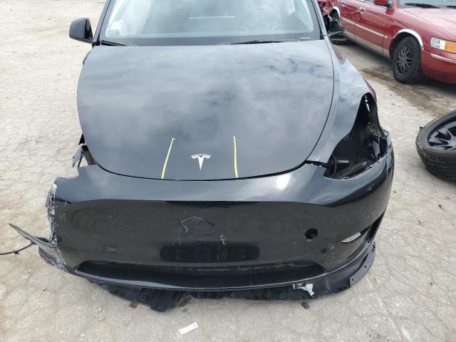 2024 Tesla Model Y VIN: 7SAYGDEE7RA219076 Lot: 60963374