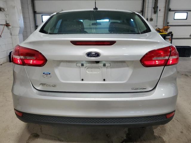 2016 Ford Focus S VIN: 1FADP3E27GL275744 Lot: 57859774