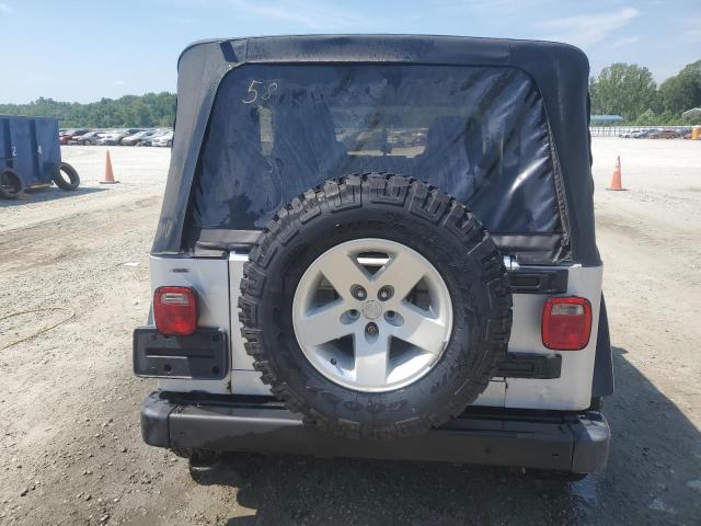 2005 Jeep Wrangler / Tj Rubicon VIN: 1J4FA69SX5P304332 Lot: 58665104