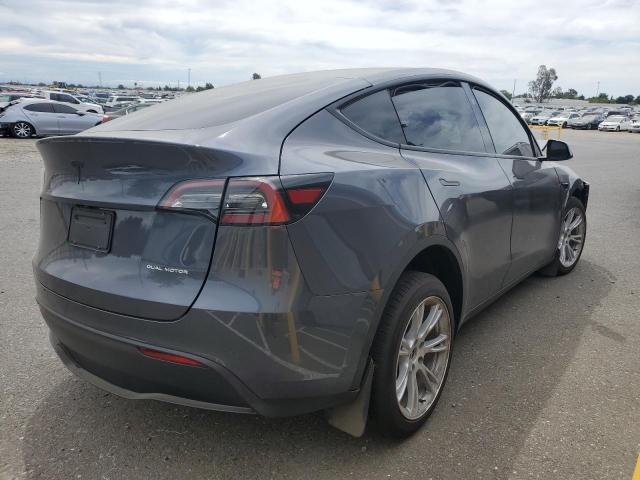 2023 Tesla Model Y VIN: 7SAYGDEE6PF883367 Lot: 56275914