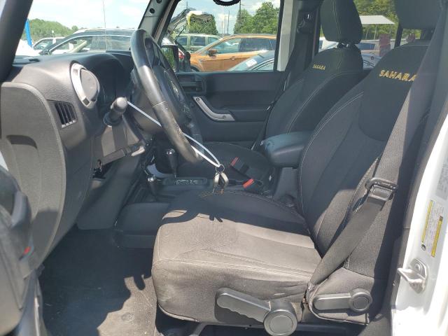 2015 Jeep Wrangler Unlimited Sahara VIN: 1C4BJWEGXFL555141 Lot: 57202214