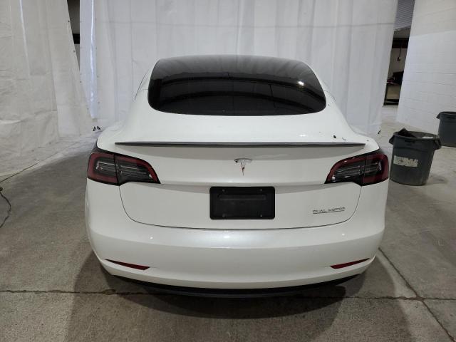 2023 Tesla Model 3 VIN: 5YJ3E1EC7PF562772 Lot: 59877224