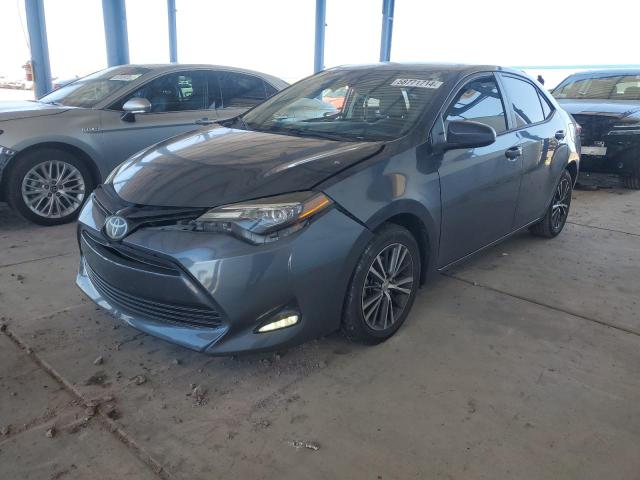 VIN 5YFBURHE0HP676029 2017 Toyota Corolla, L no.1