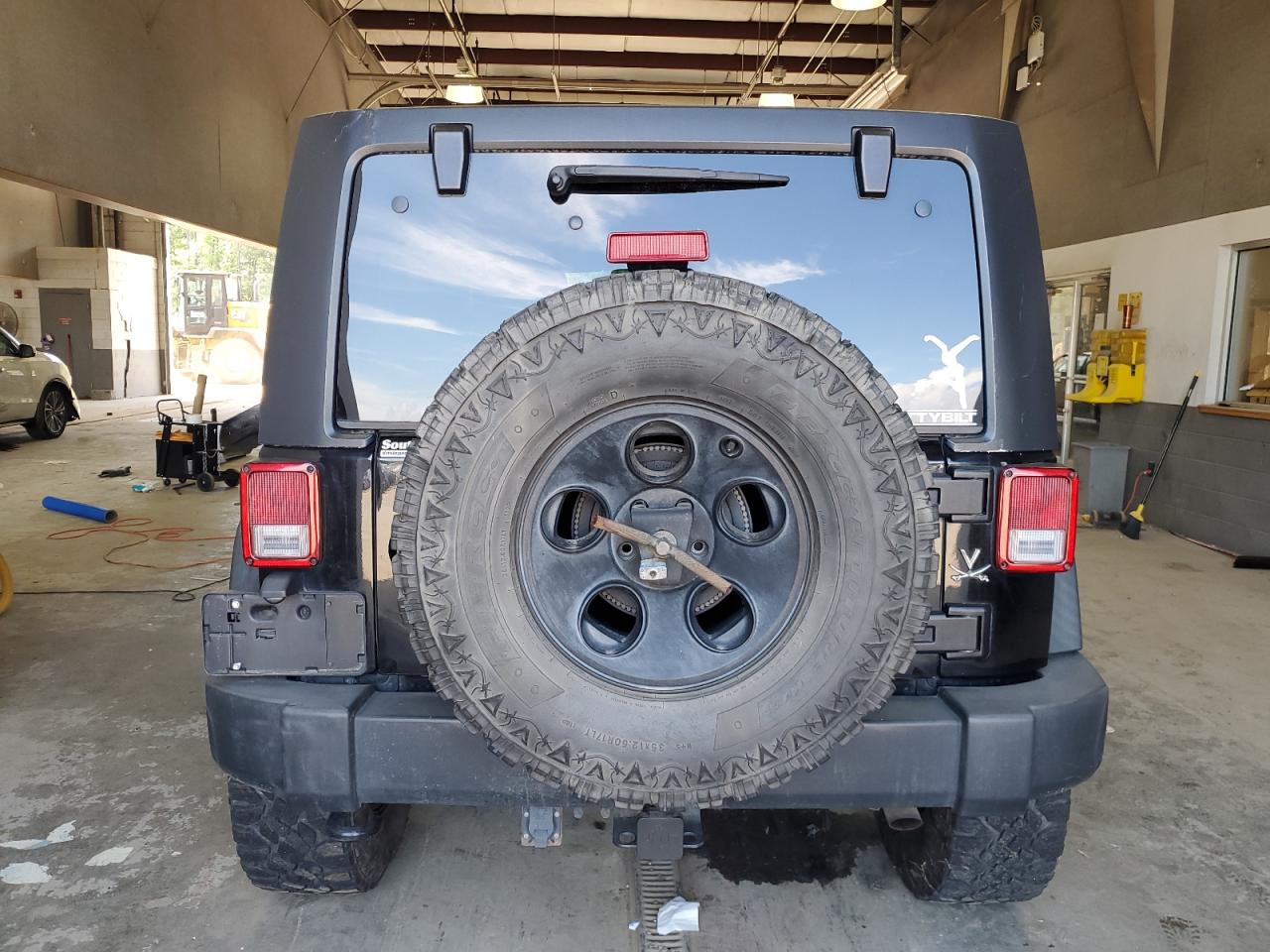 1C4BJWDG2EL123319 2014 Jeep Wrangler Unlimited Sport
