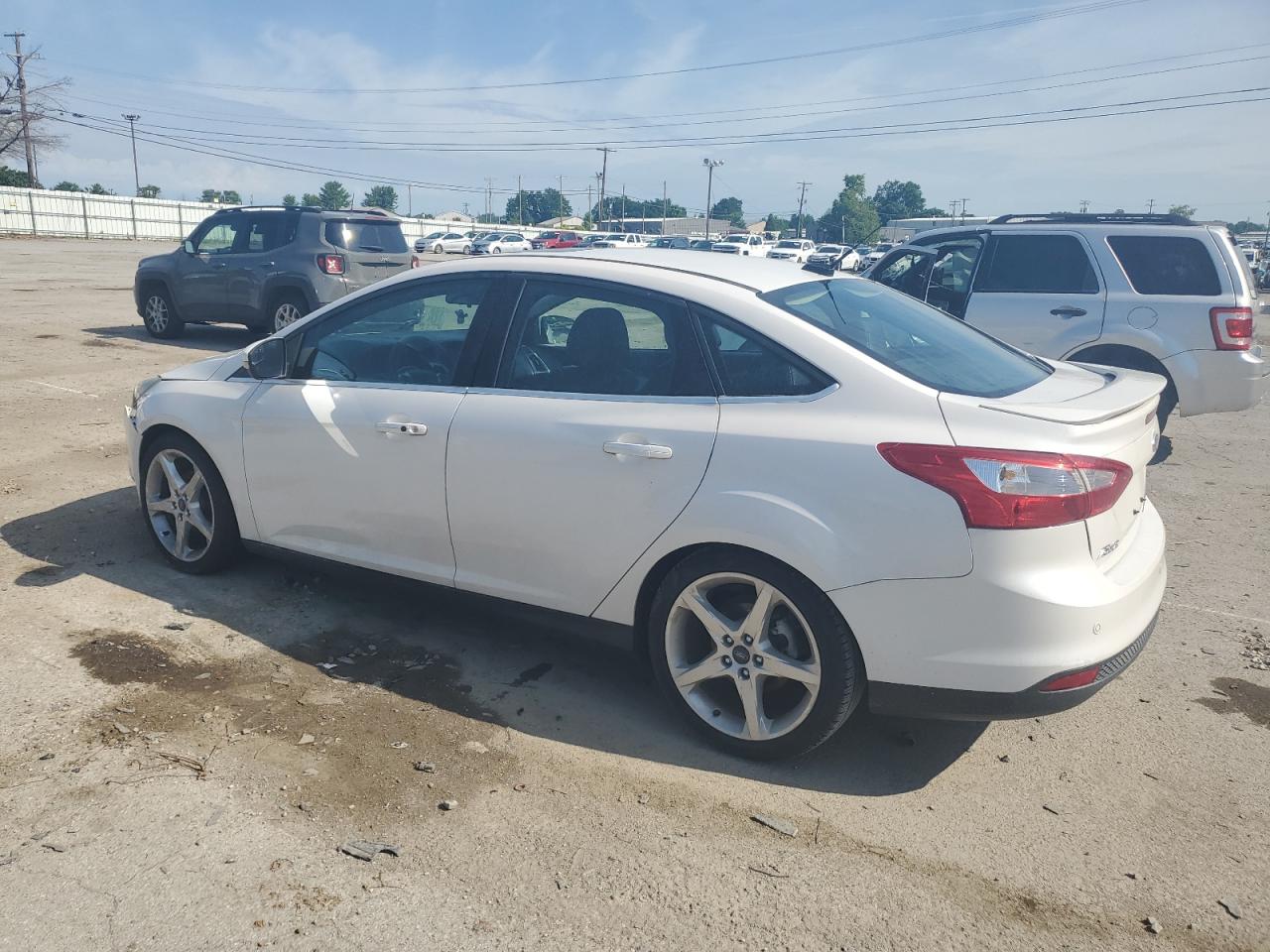 2014 Ford Focus Titanium vin: 1FADP3J26EL185648