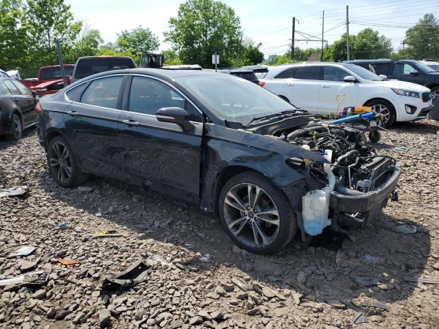 3FA6P0D99LR138029 Ford Fusion TIT 4