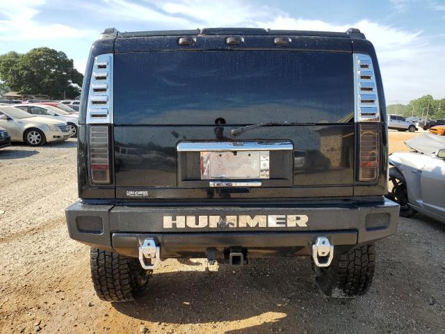 2003 Hummer H2 VIN: 5GRGN23U13H104057 Lot: 58420024
