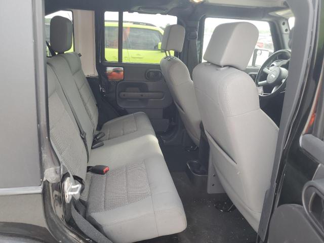 2009 Jeep Wrangler Unlimited Sahara VIN: 1J4GA59139L706227 Lot: 58869224