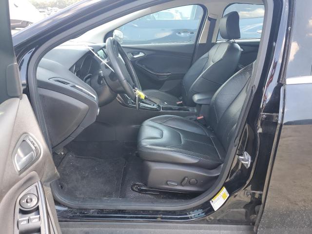 2016 Ford Focus Titanium VIN: 1FADP3J26GL313227 Lot: 57723214