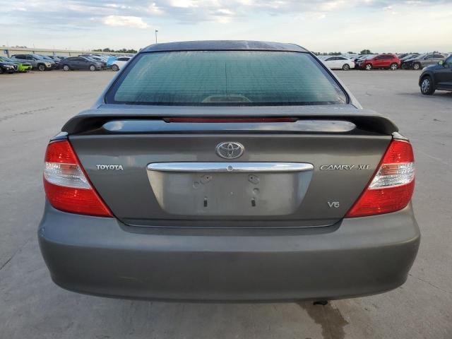 2003 Toyota Camry Le VIN: JTDBF32KX30147776 Lot: 57951884