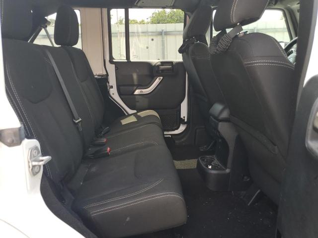 2015 Jeep Wrangler Unlimited Sahara VIN: 1C4BJWEGXFL555141 Lot: 57202214