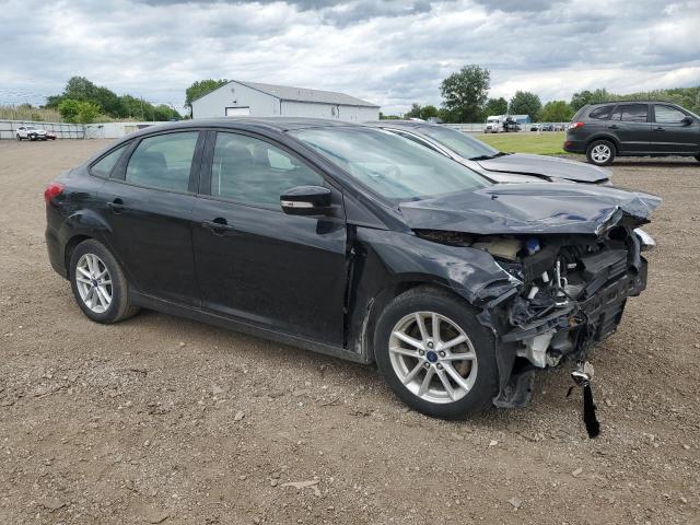 VIN 1FADP3F23HL341304 2017 Ford Focus, SE no.4