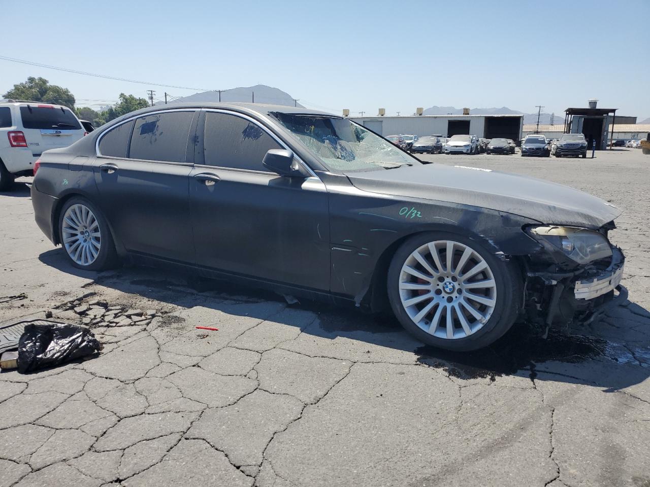 2012 BMW 740 I vin: WBAKA4C55CDS99015