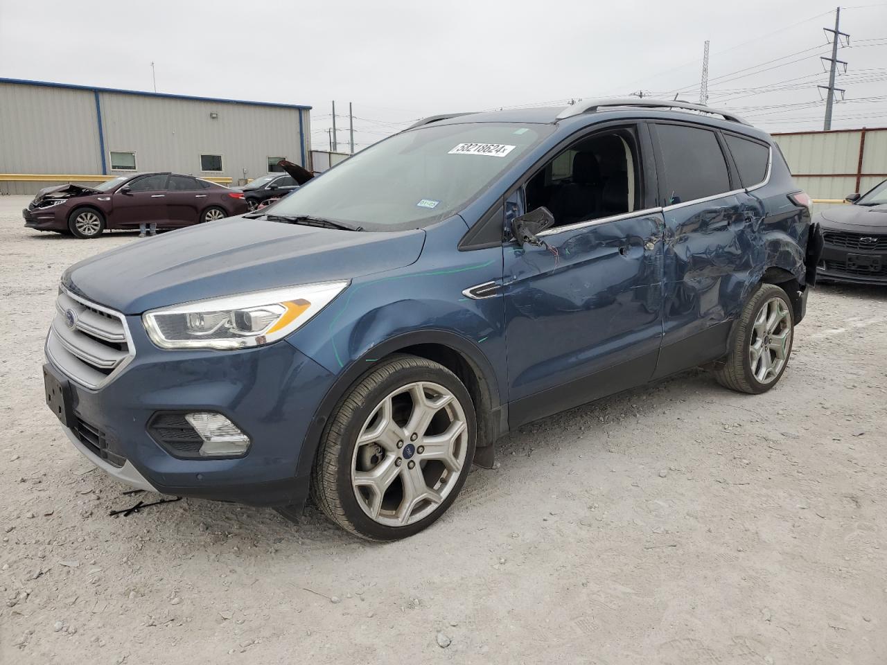 1FMCU0J99JUB05916 2018 Ford Escape Titanium