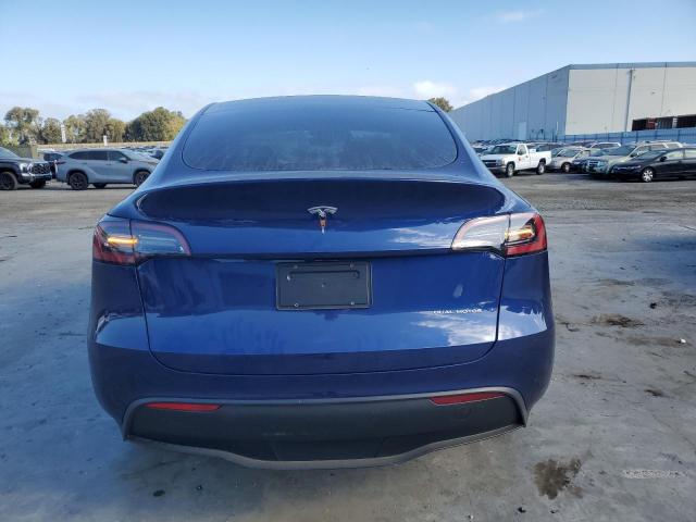 2024 Tesla Model Y VIN: 7SAYGDEE9RF985376 Lot: 59180094