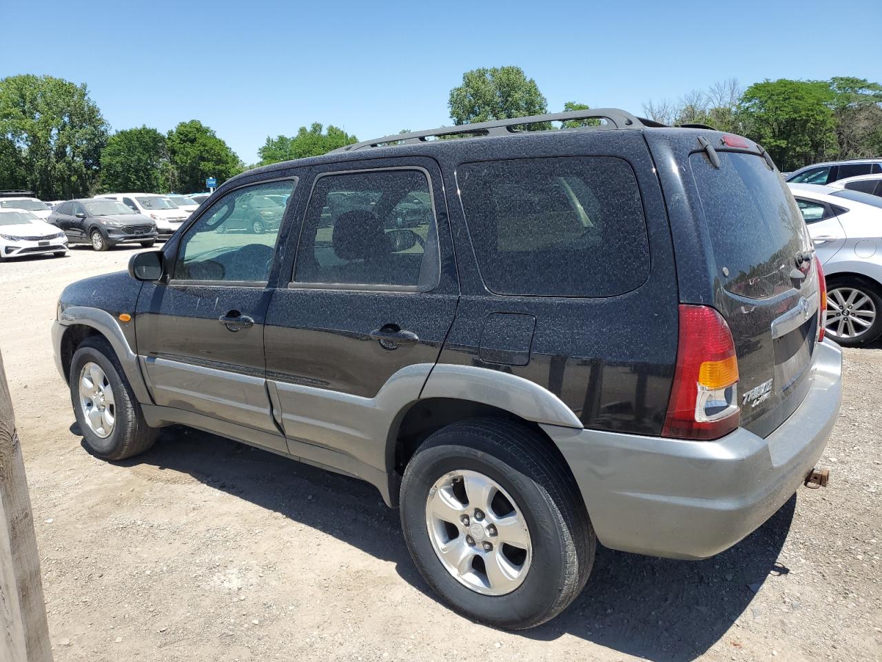 4F2YU08132KM23716 2002 Mazda Tribute Lx