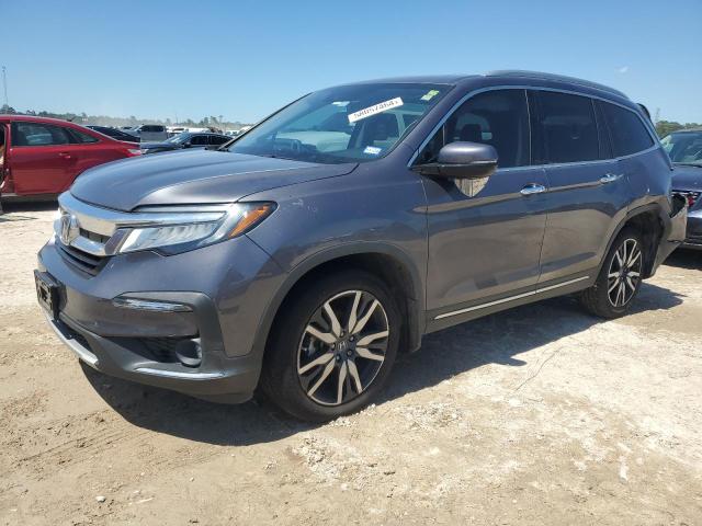 2021 HONDA PILOT TOUR 5FNYF5H97MB004555  66390354