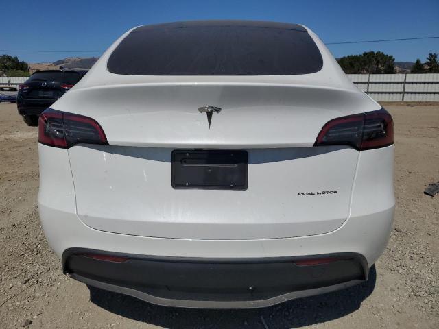 2023 Tesla Model Y VIN: 7SAYGAEEXPF877019 Lot: 58166734