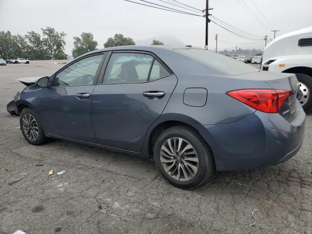 2017 Toyota Corolla L VIN: 5YFBURHEXHP687104 Lot: 57338634